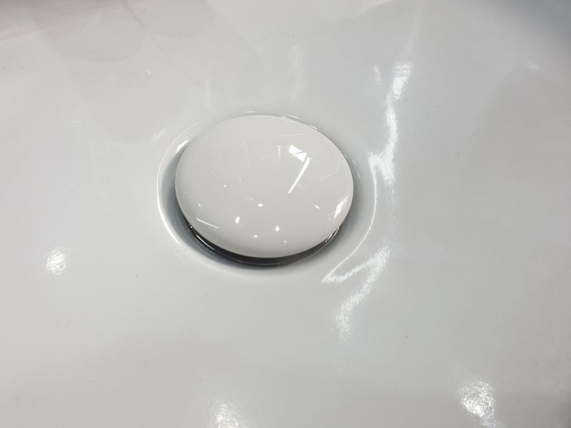 Белый Донный клапан для умывальника и биде, универсальный. Roca Aqua A505401100 A505401100 фото